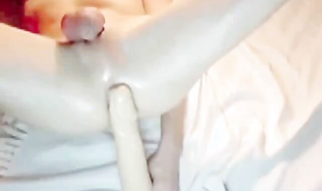 Oiled Twink Masturbates with a Giant Dildo