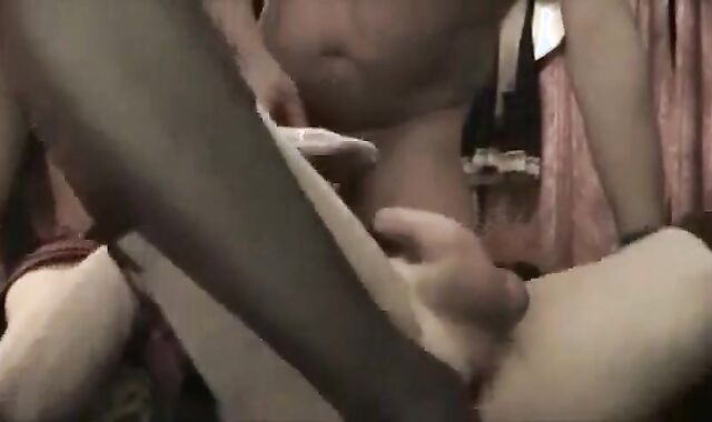 Cum-drenched Crossdresser Gets Bukkake by Big Cocks