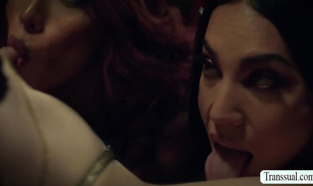 Busty witch summons two shemale and get fucked