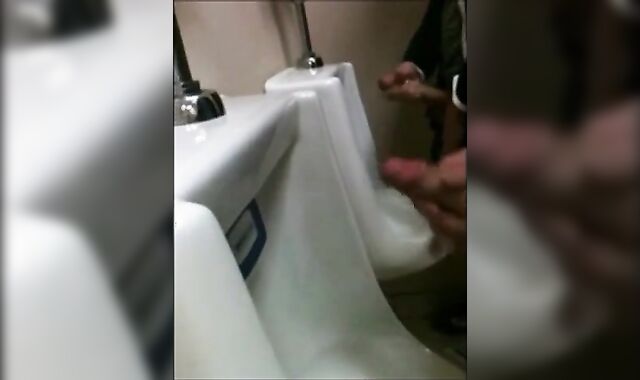 Outdoor Wank Session for Two Slim Dicks at the Urinals