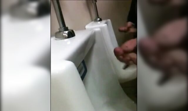 Outdoor Wank Session for Two Slim Dicks at the Urinals