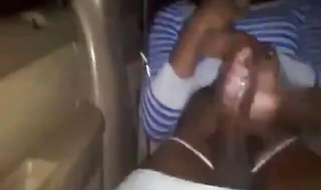 Black Crossdresser Receives a Handjob