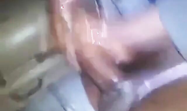 Black Crossdresser Receives a Handjob
