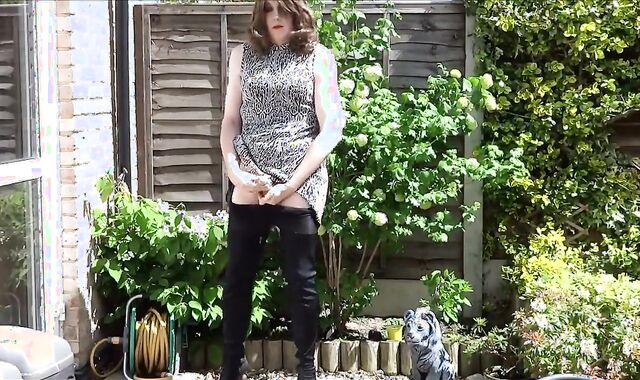 Thigh-booted Crossdresser Strokes Outdoors 3