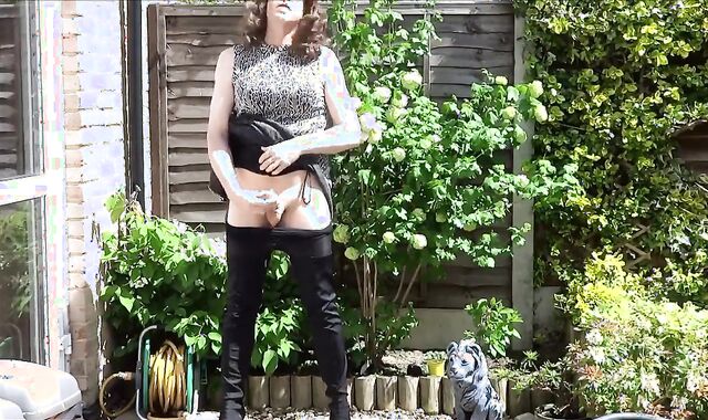 Thigh-booted Crossdresser Strokes Outdoors 3