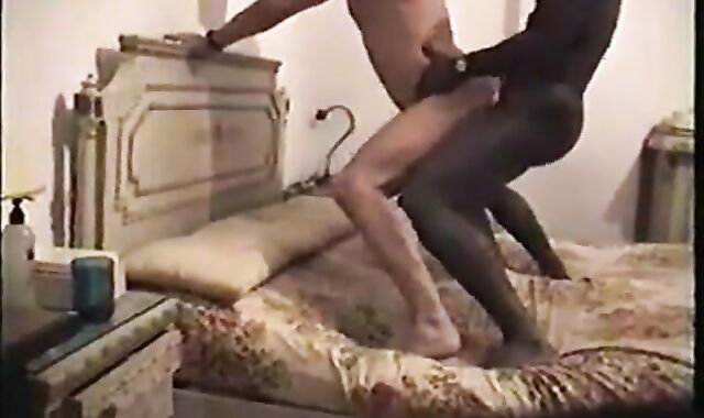 Black Stud Takes it Standing on the Bed