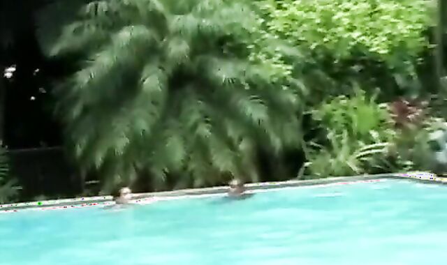 Spy monitors a pretty poolside three-way