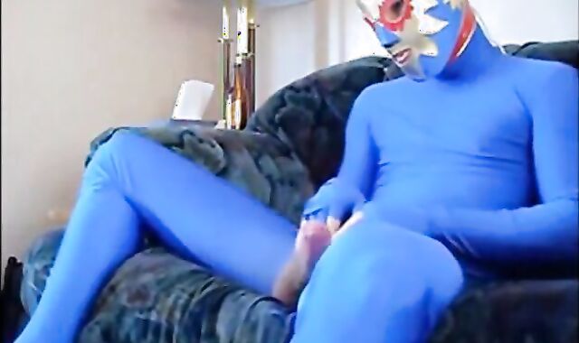 Masked Guy in Blue Zentai Suit Strokes Big Cock