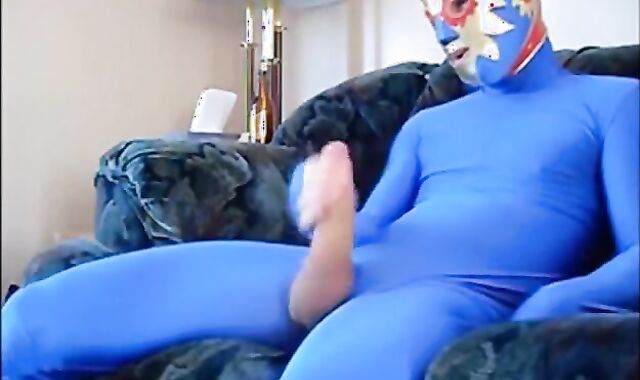 Masked Guy in Blue Zentai Suit Strokes Big Cock
