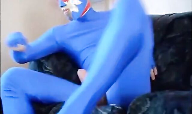 Masked Guy in Blue Zentai Suit Strokes Big Cock