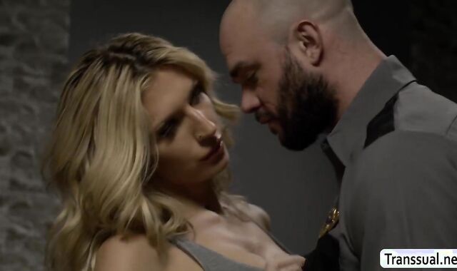 Horny jailofficer fucks the new busty TS inmate