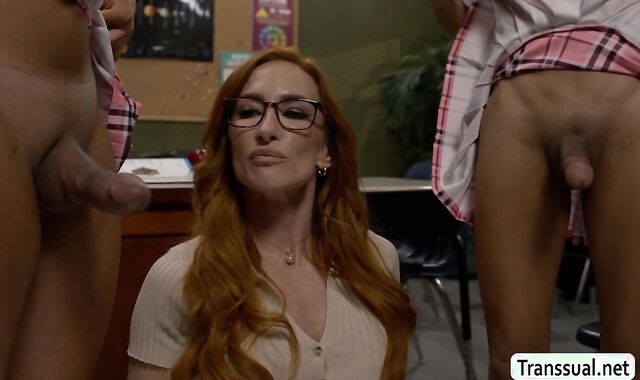 Two TS students fuck their redhead teacher