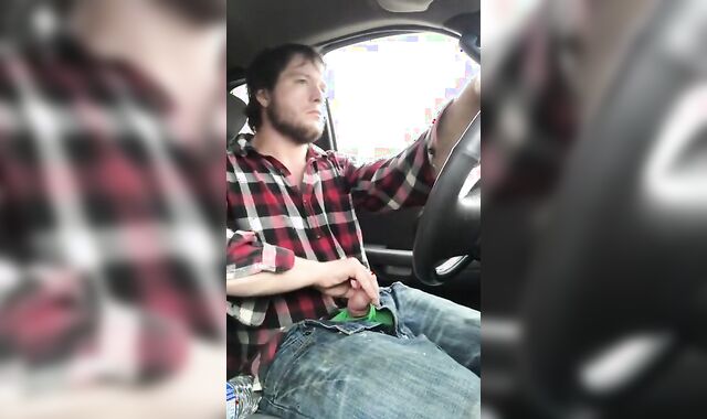 Stroking my big cock while driving