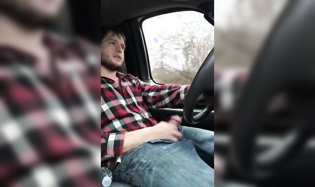 Stroking my big cock while driving
