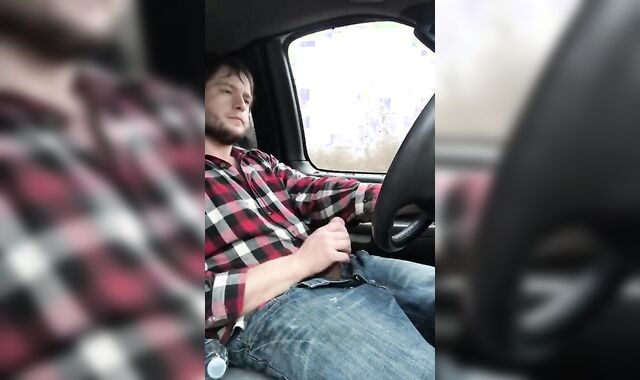 Stroking my big cock while driving