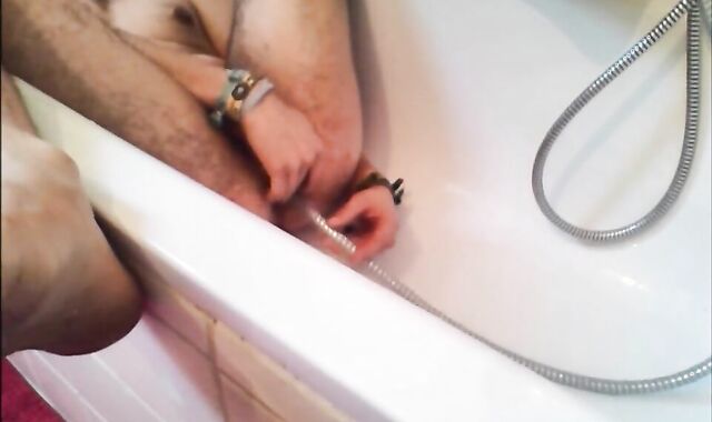 Twink Uses Shower Head for Enema and Masturbates