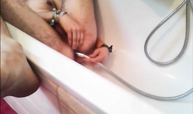 Twink Uses Shower Head for Enema and Masturbates