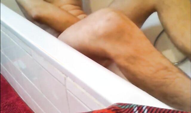 Twink Uses Shower Head for Enema and Masturbates