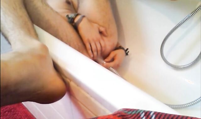 Twink Uses Shower Head for Enema and Masturbates