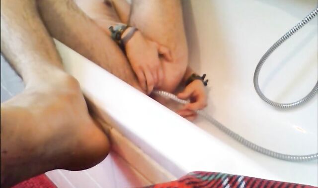 Twink Uses Shower Head for Enema and Masturbates