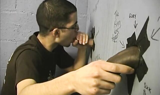 Milky teenager gargling Off dark lollipops At Gloryhole