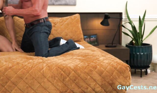 Mature Daddy Takes Control of Muscular Stud on Couch